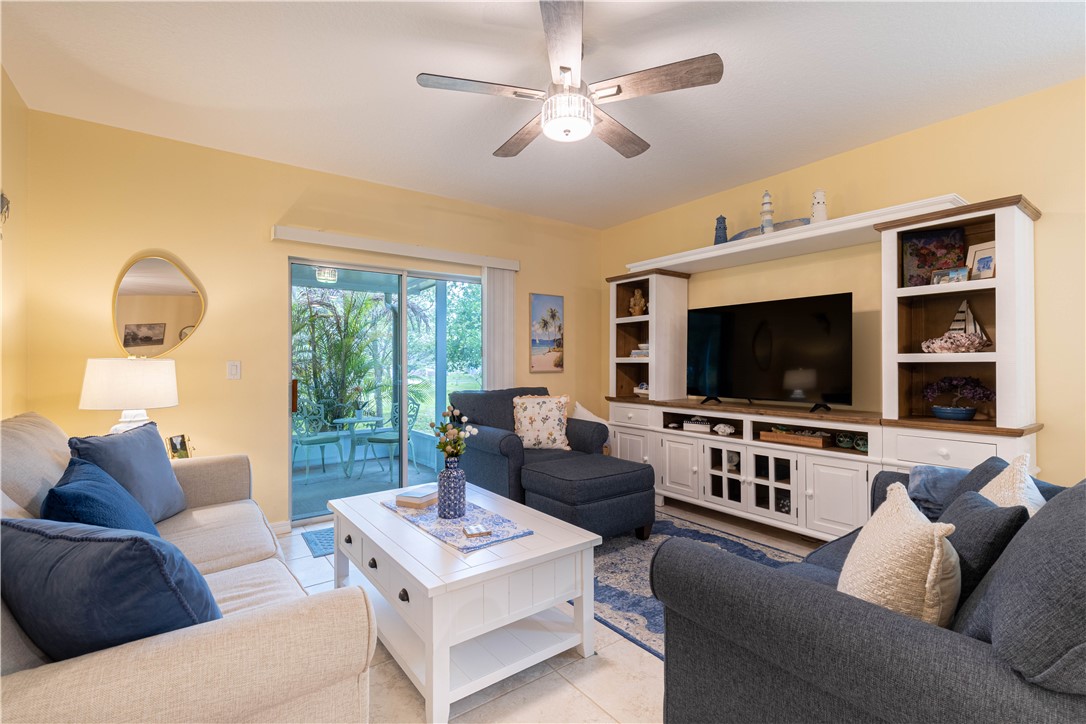 898 Lorca Avenue Sebastian, FL 32958 - Photo 22 of 36 a living room with furniture and a flat screen tv