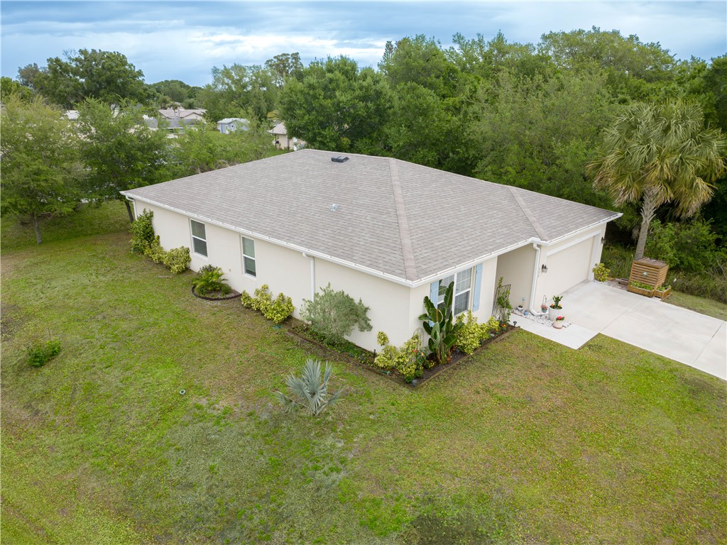 898 Lorca Avenue Sebastian, FL 32958 - Photo 3 of 36 an aerial view of a house