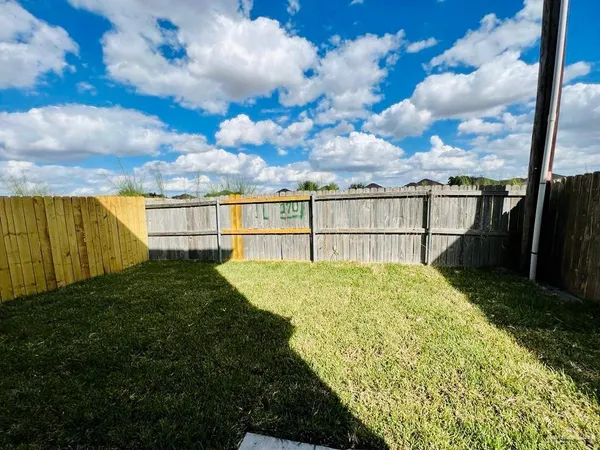 a view of a backyard with garden