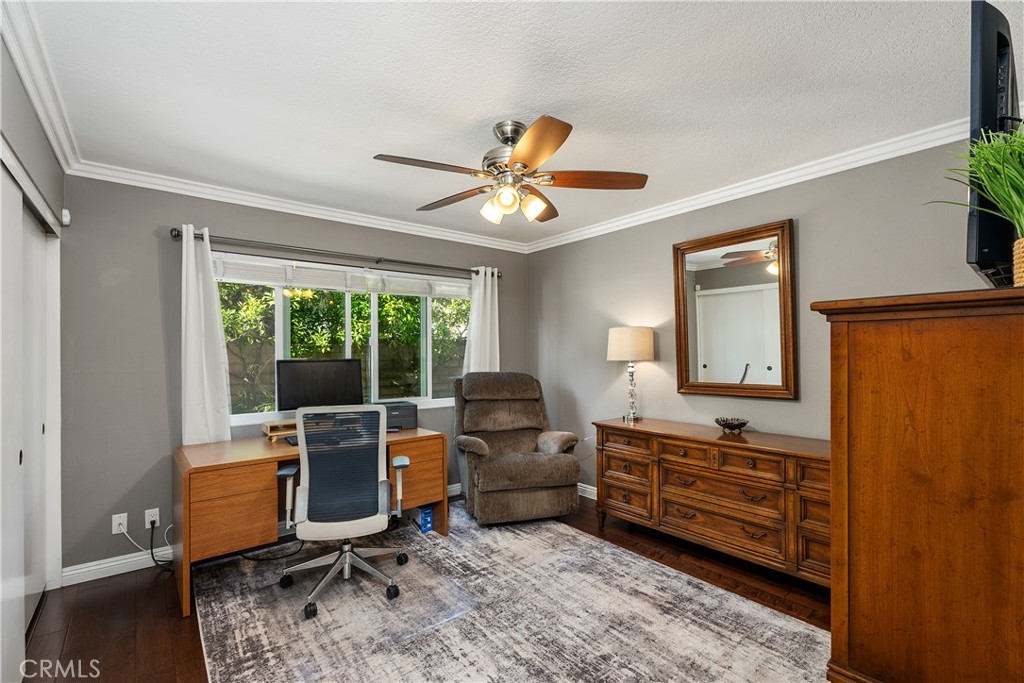31041 Augusta Drive Laguna Niguel, CA 92677 - Photo 15 of 35 a living room with furniture and a flat screen tv