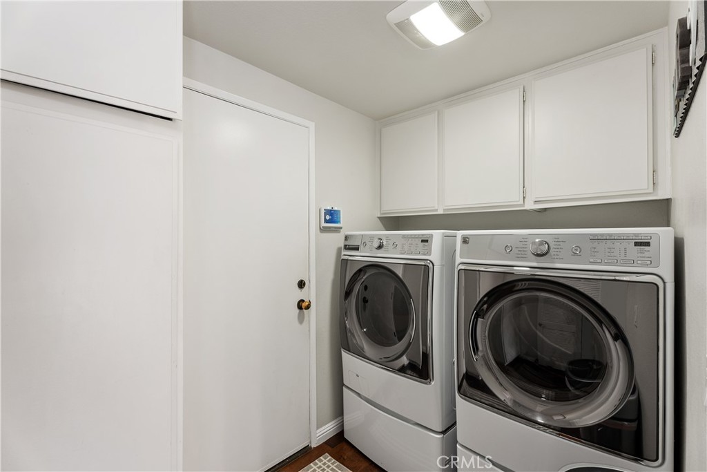 31041 Augusta Drive Laguna Niguel, CA 92677 - Photo 16 of 35 a utility room with dryer and washer