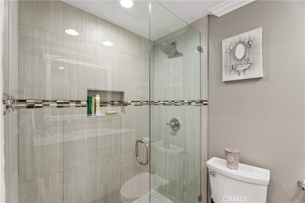 31041 Augusta Drive Laguna Niguel, CA 92677 - Photo 18 of 35 a bathroom with a toilet and a shower