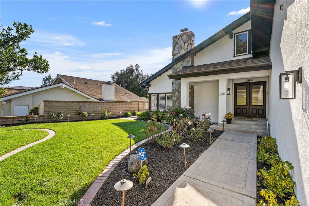 31041 Augusta Drive Laguna Niguel, CA 92677 - Photo 3 of 35 a front view of a house with garden