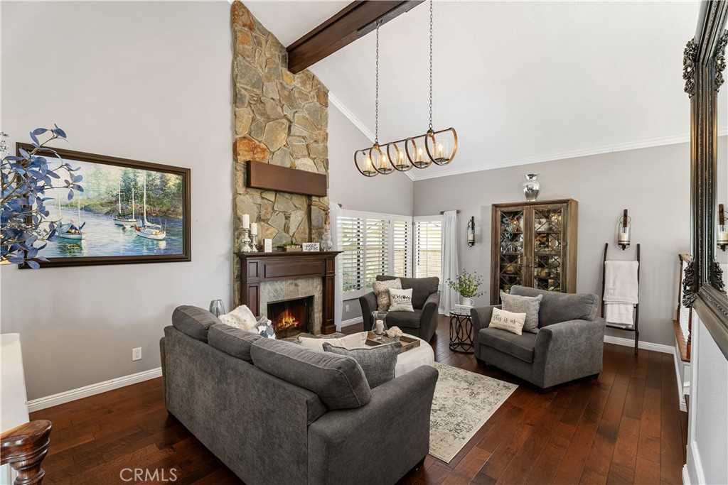 31041 Augusta Drive Laguna Niguel, CA 92677 - Photo 4 of 35 a living room with furniture and a fireplace