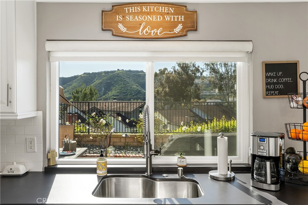 31041 Augusta Drive Laguna Niguel, CA 92677 - Photo 10 of 35 a kitchen with a stove and a shower
