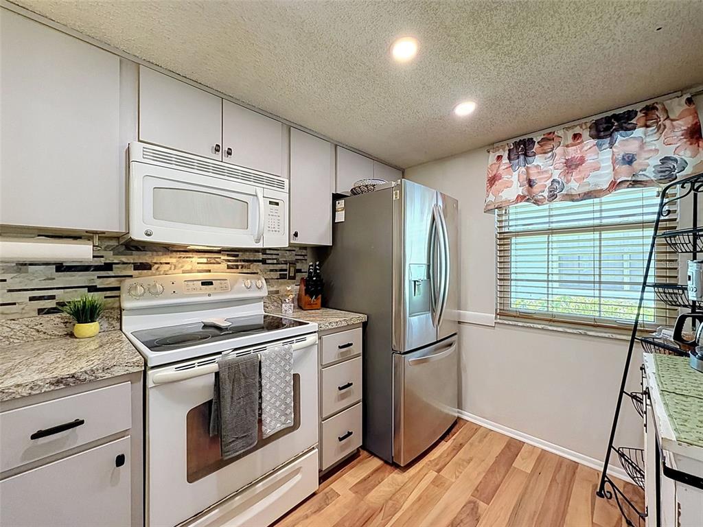8220 7 Oaks Court, Unit 5 Port Richey, FL 34668 - Photo 5 of 22