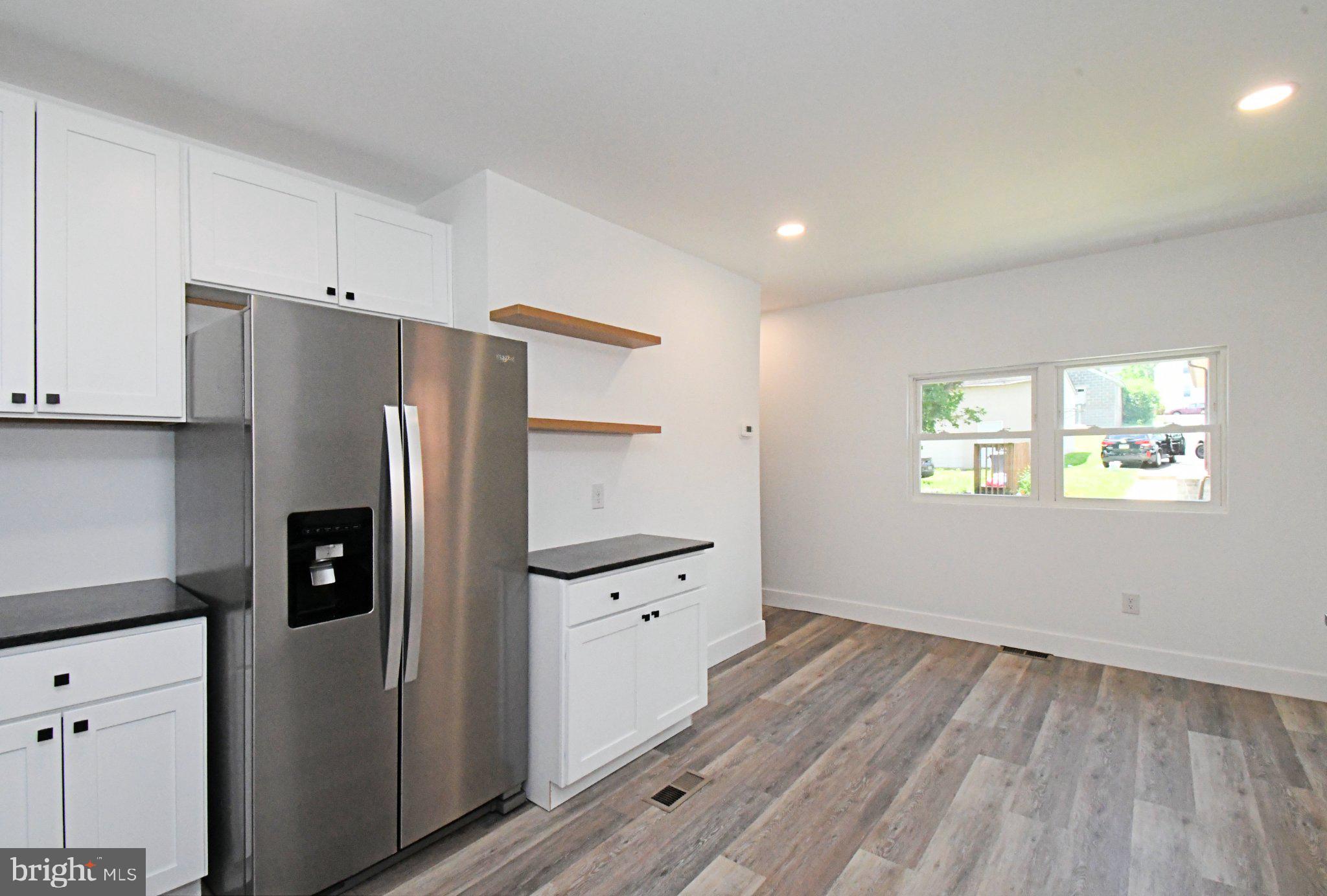 64 North Main Street Spring City, PA 19475 - Photo 11 of 26 Modern kitchen with sleek finishes.