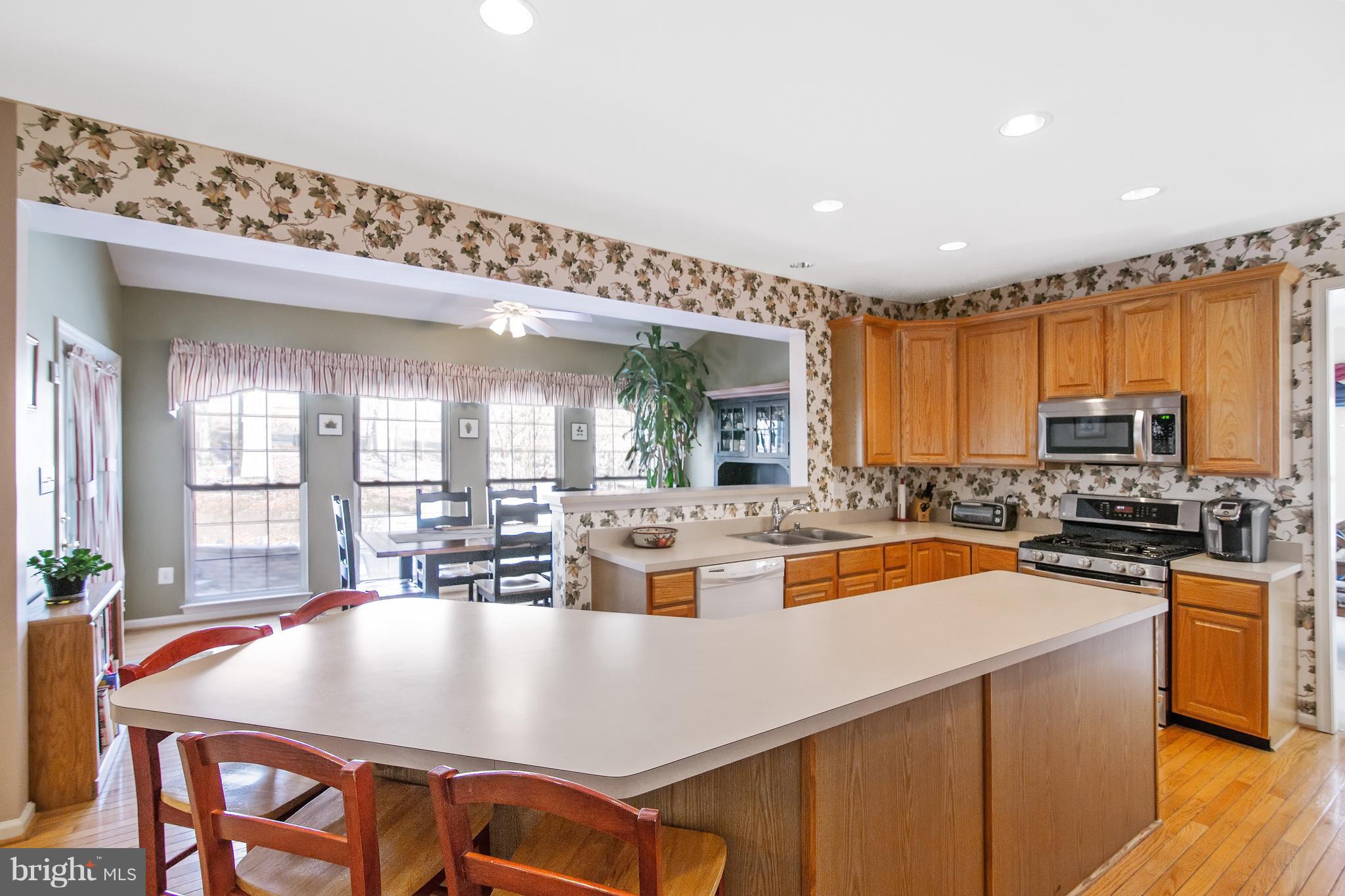 6430 Spring Forest Road Frederick, MD 21701 - Photo 5 of 28 Kitchen/extended island/tons of cabinet space