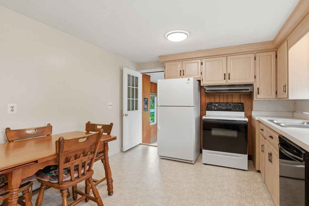 188 Glendale Road Attleboro, MA 02703 - Photo 9 of 37 a kitchen with a refrigerator a stove and a refrigerator