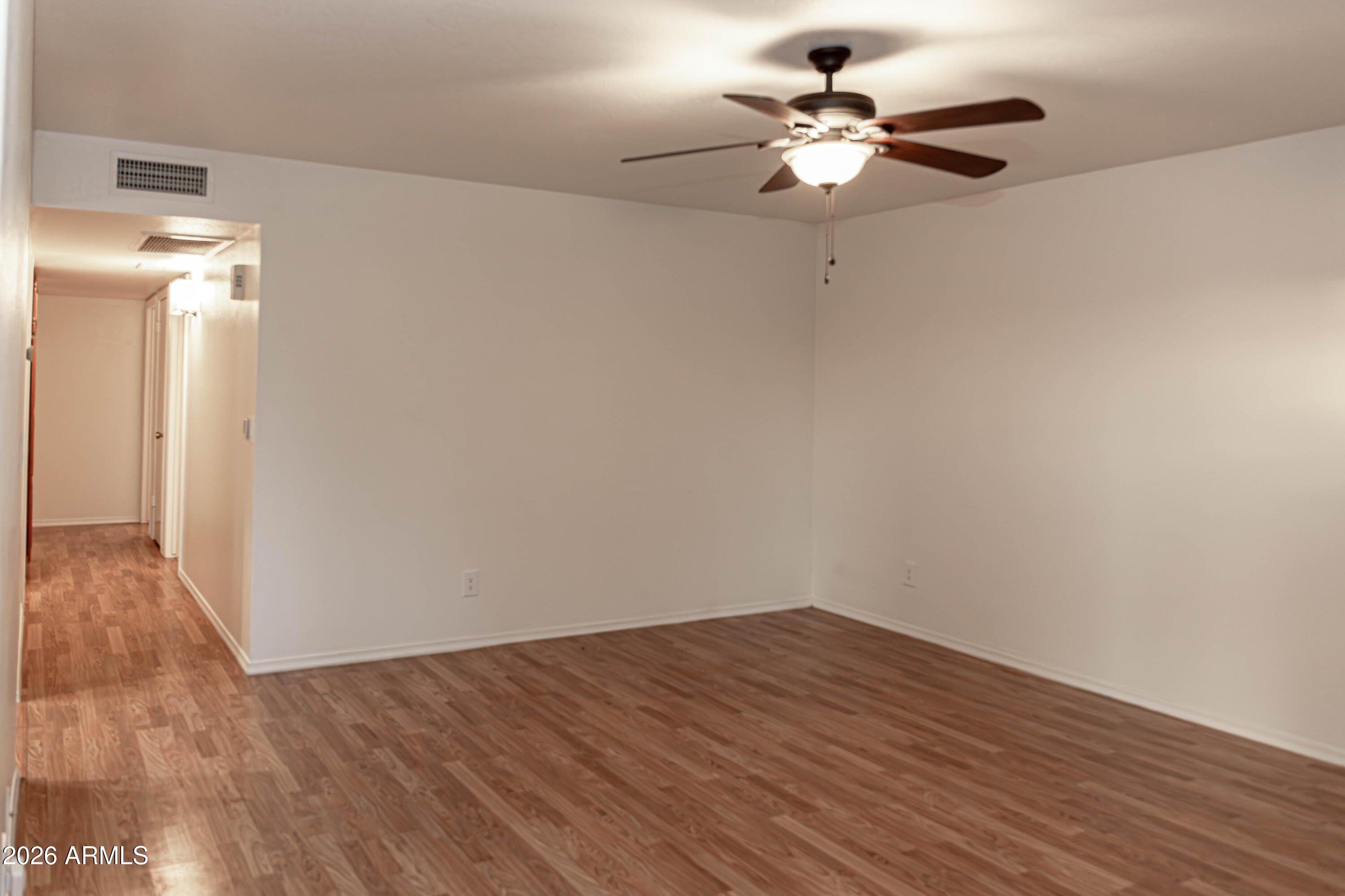 6544 East Dodge Street Mesa, AZ 85205 - Photo 11 of 22 a view of a workspace with wooden floor