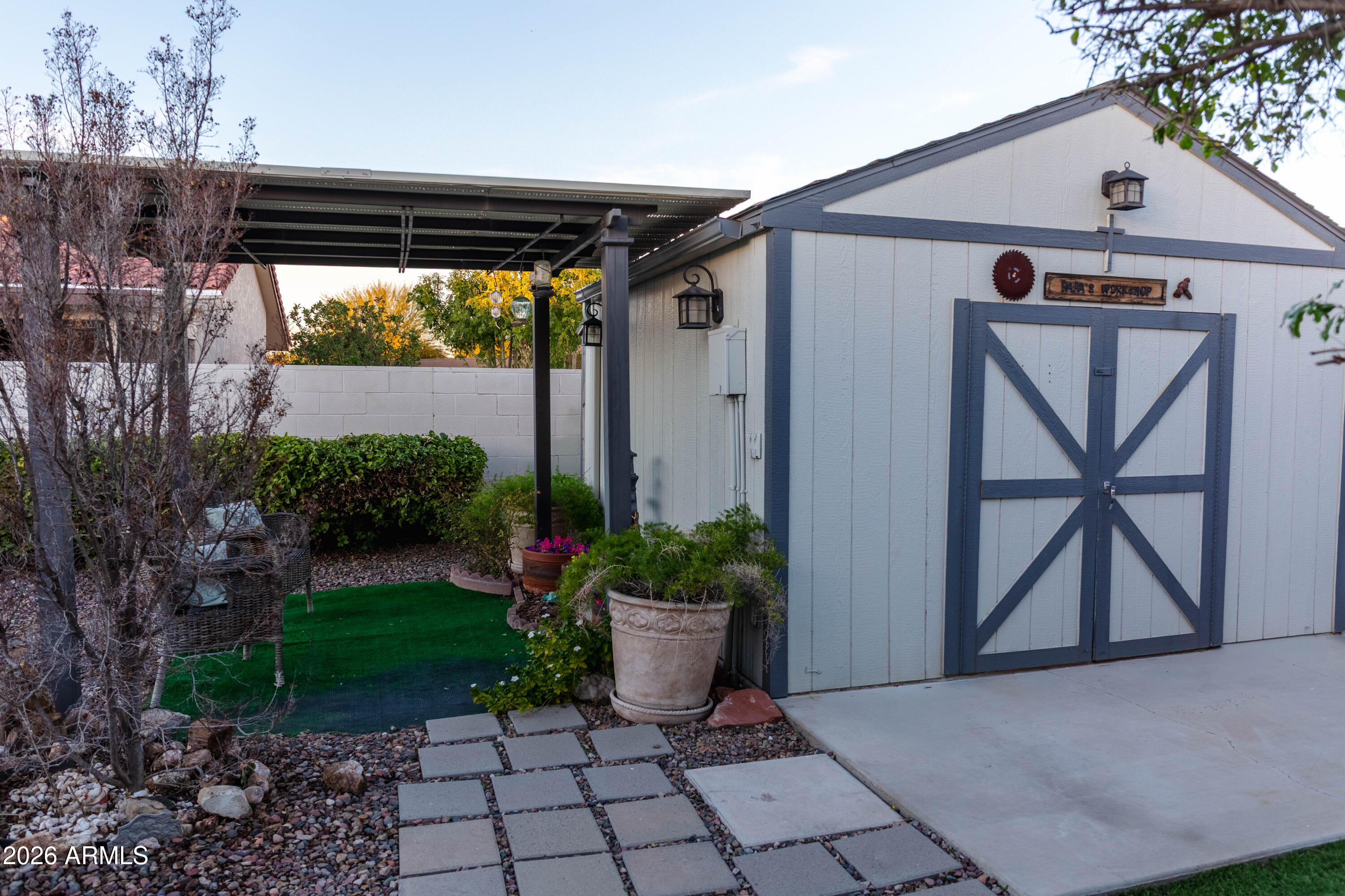 6544 East Dodge Street Mesa, AZ 85205 - Photo 19 of 22 a front view of a house having yard