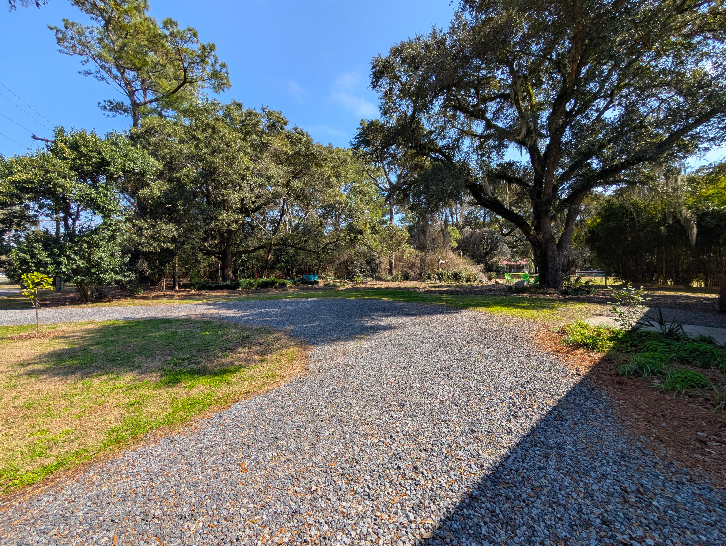 123 Cassena Street McClellanville, SC 29458 - Photo 34 of 37 30-Left-Yard