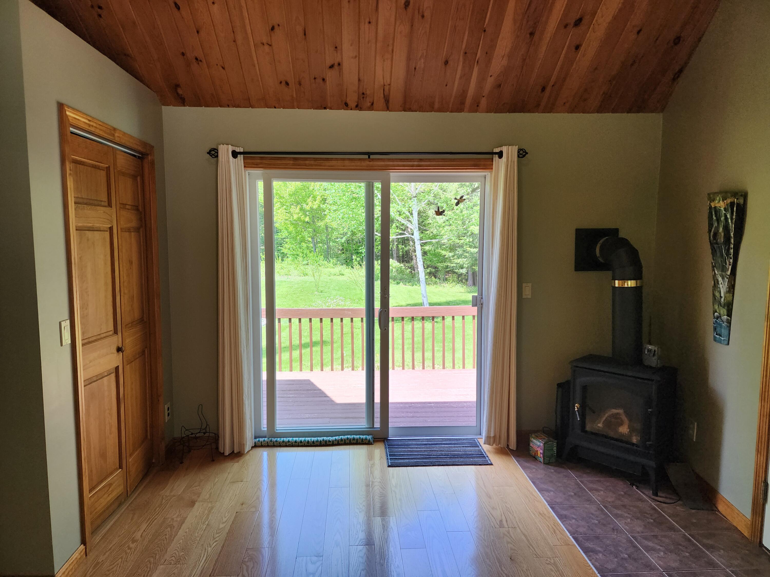8 Loon Cove Road Livermore, ME 04253 - Photo 23 of 54 Shows propane stove & coat closet.