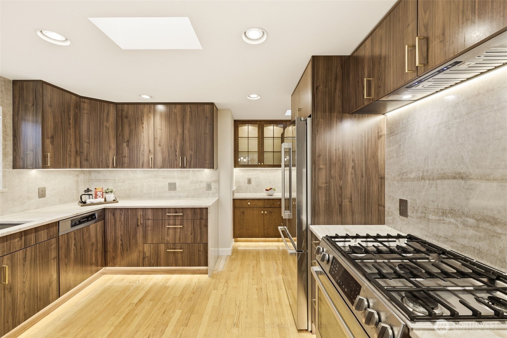 3601 Northeast 100th Street Seattle, WA 98115 - Photo 15 of 37 a kitchen with granite countertop a stove and cabinets