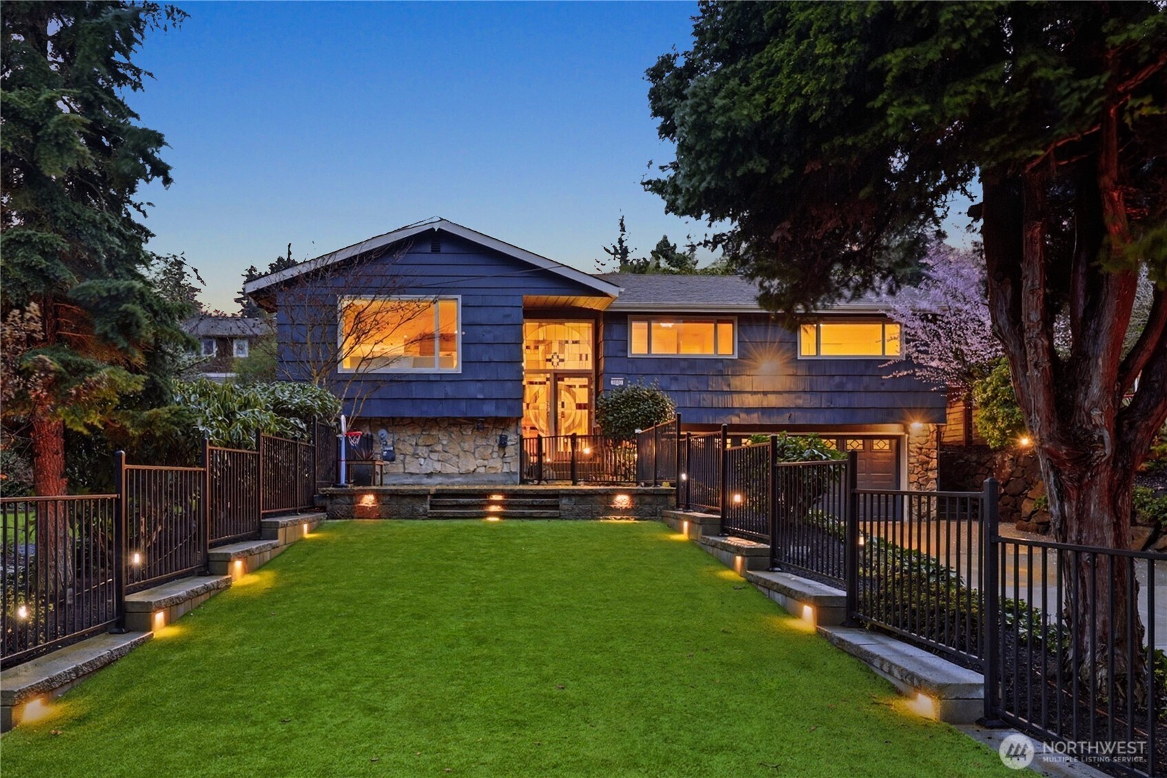 3601 Northeast 100th Street Seattle, WA 98115 - Photo 2 of 37 a house view with a swimming pool and garden space