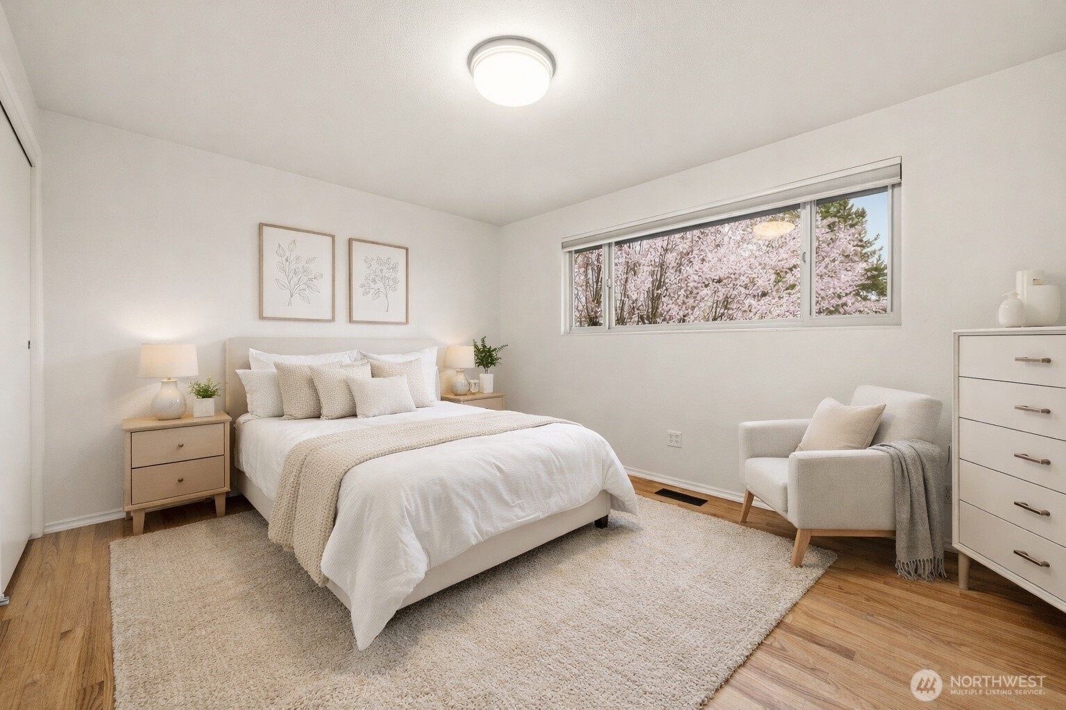 3601 Northeast 100th Street Seattle, WA 98115 - Photo 22 of 37 a bedroom with a bed and a painting on the wall