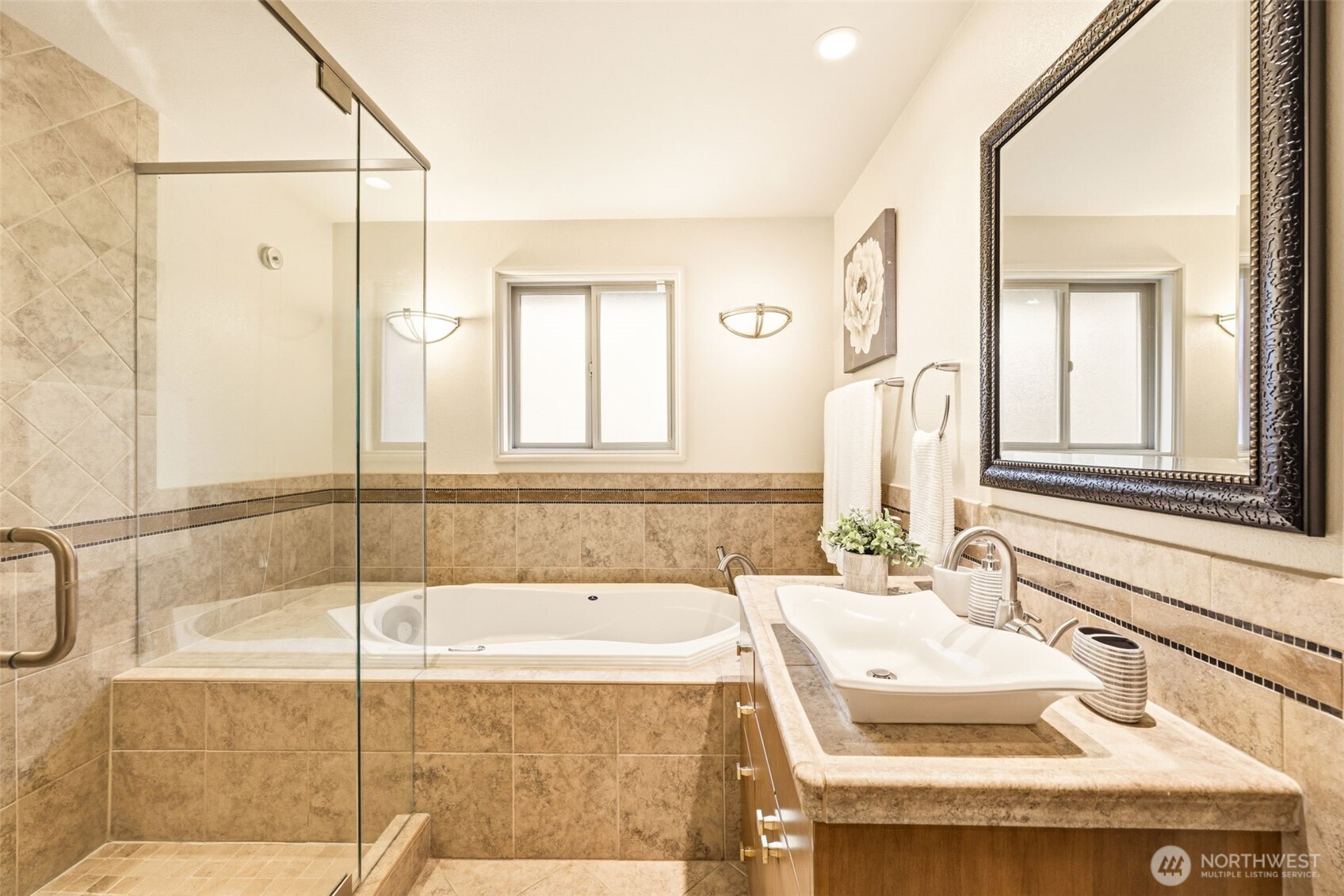 3601 Northeast 100th Street Seattle, WA 98115 - Photo 23 of 37 a bathroom with a sink and a mirror