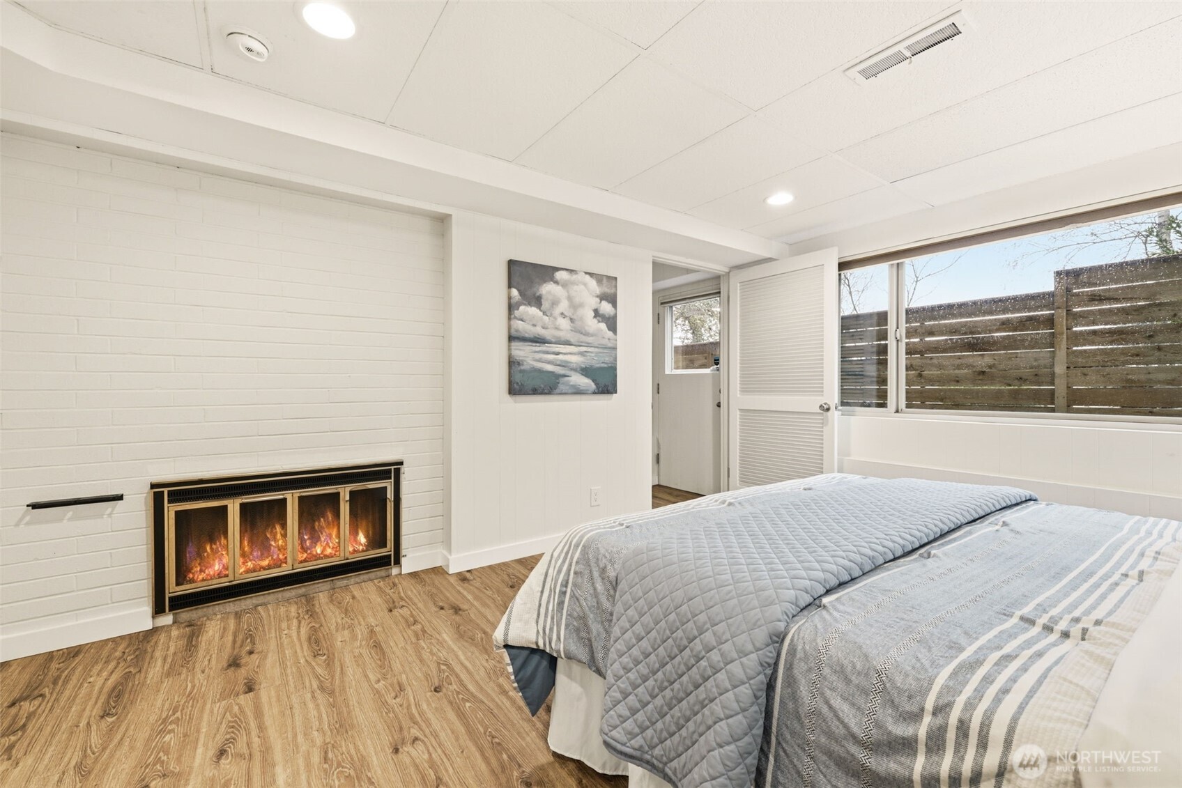 3601 Northeast 100th Street Seattle, WA 98115 - Photo 26 of 37 a spacious bedroom with a bed and a television