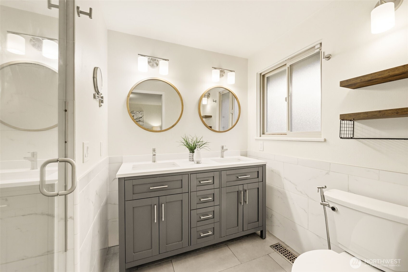 3601 Northeast 100th Street Seattle, WA 98115 - Photo 30 of 37 a bathroom with a granite countertop sink mirror and toilet