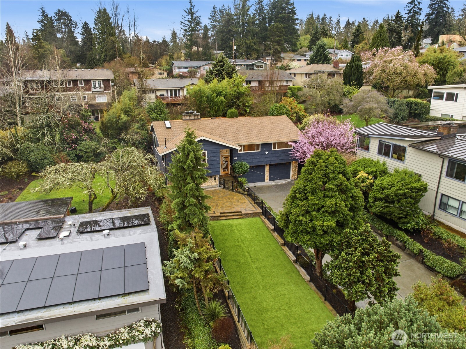 3601 Northeast 100th Street Seattle, WA 98115 - Photo 6 of 37 an aerial view of a house with a garden and trees