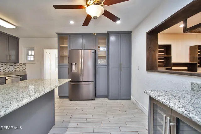 a view of kitchen with cabinets and wooden floor