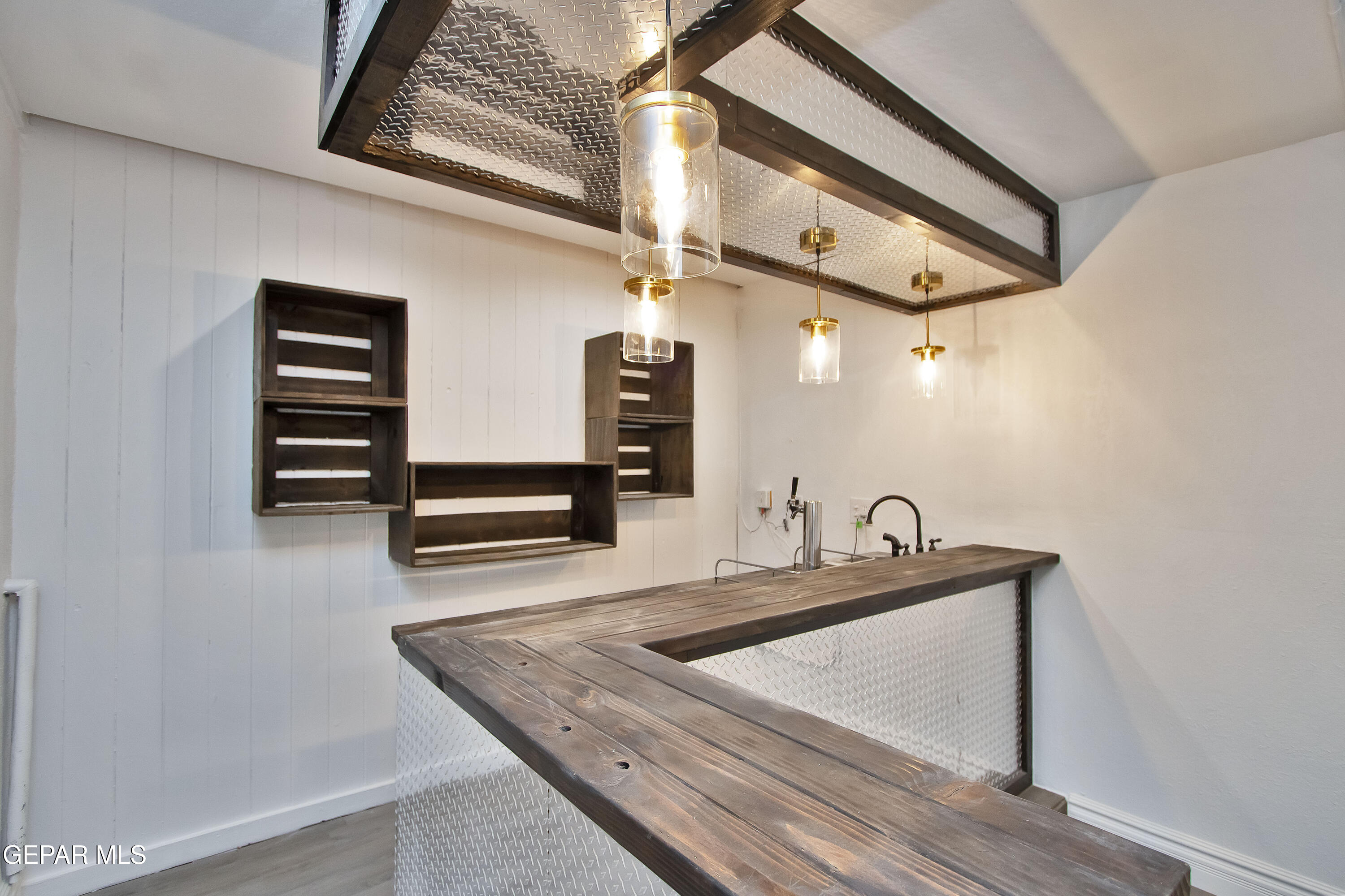 8415 Mt Ranier Drive El Paso, TX 79904 - Photo 24 of 69 a bathroom with a sink and a mirror