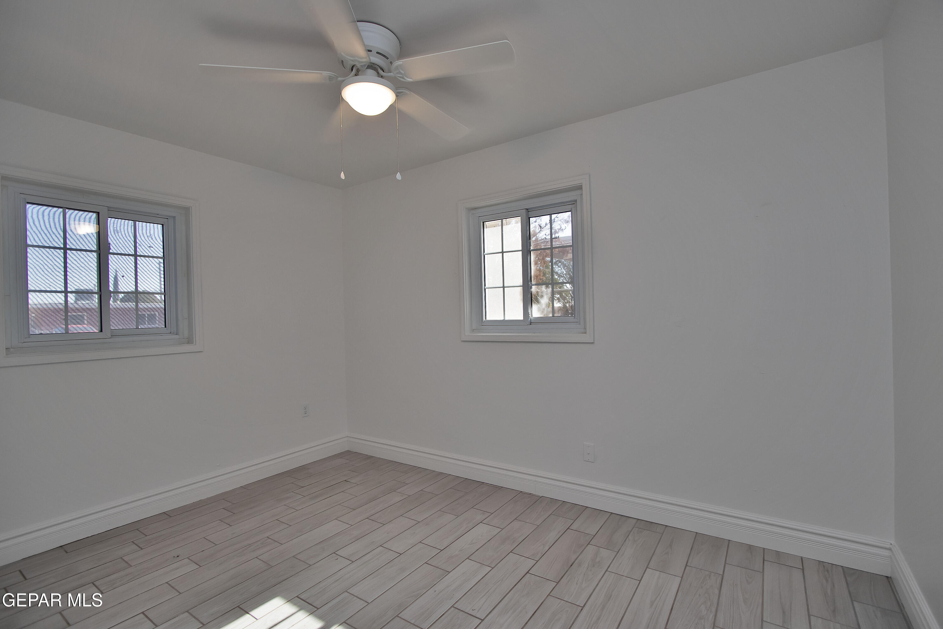 8415 Mt Ranier Drive El Paso, TX 79904 - Photo 40 of 69 an empty room with a window