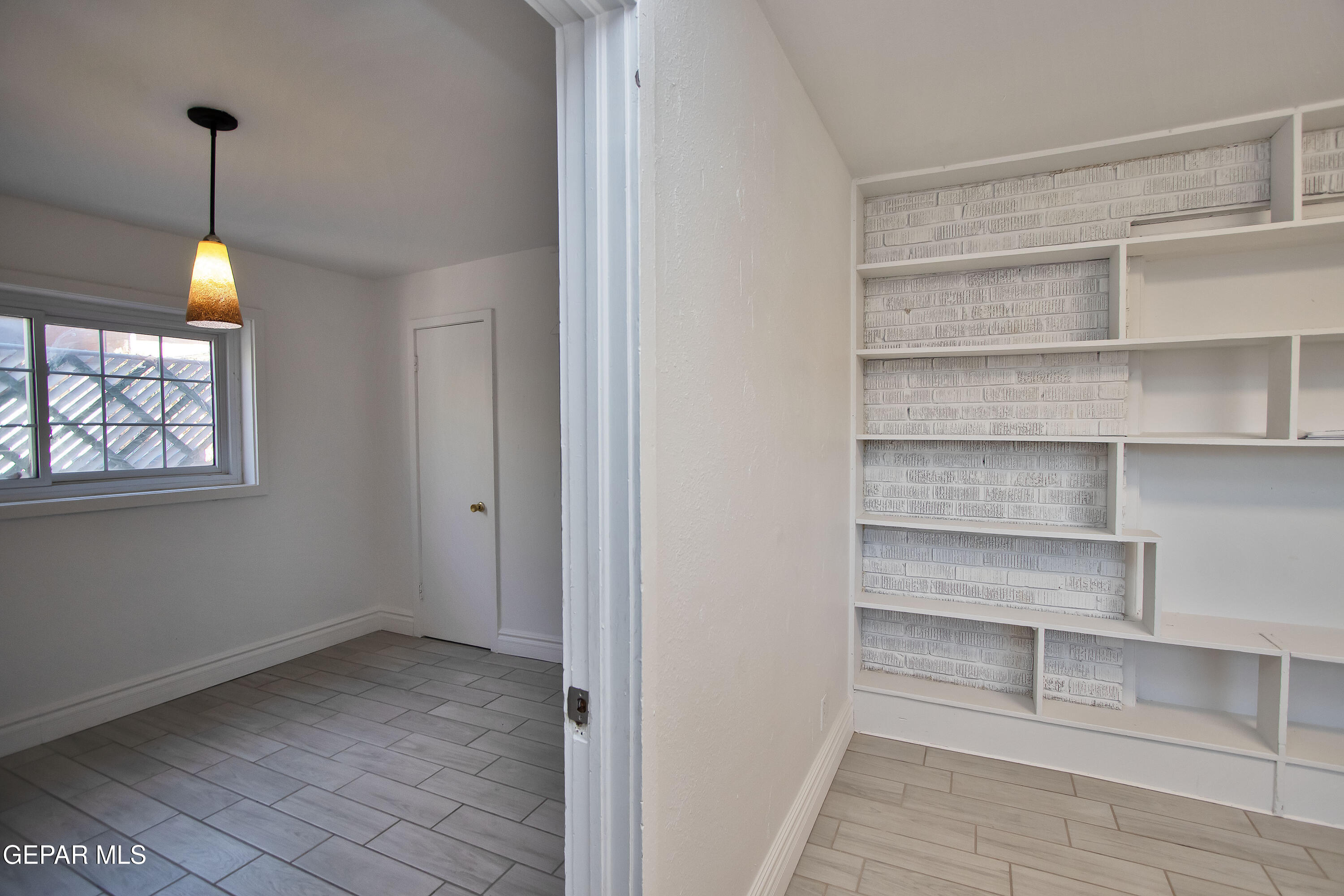 8415 Mt Ranier Drive El Paso, TX 79904 - Photo 49 of 69 a view of an empty room with a window