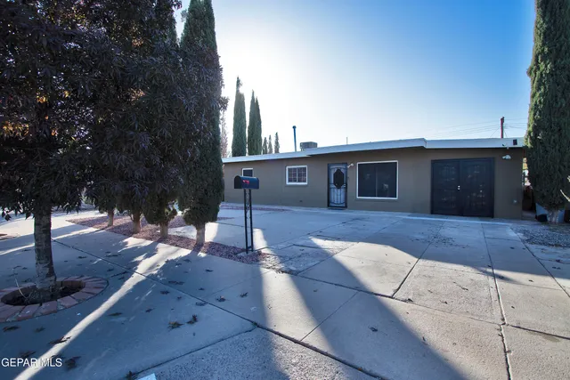 a view of a kitchen with a sink stainless steel appliances and cabinets