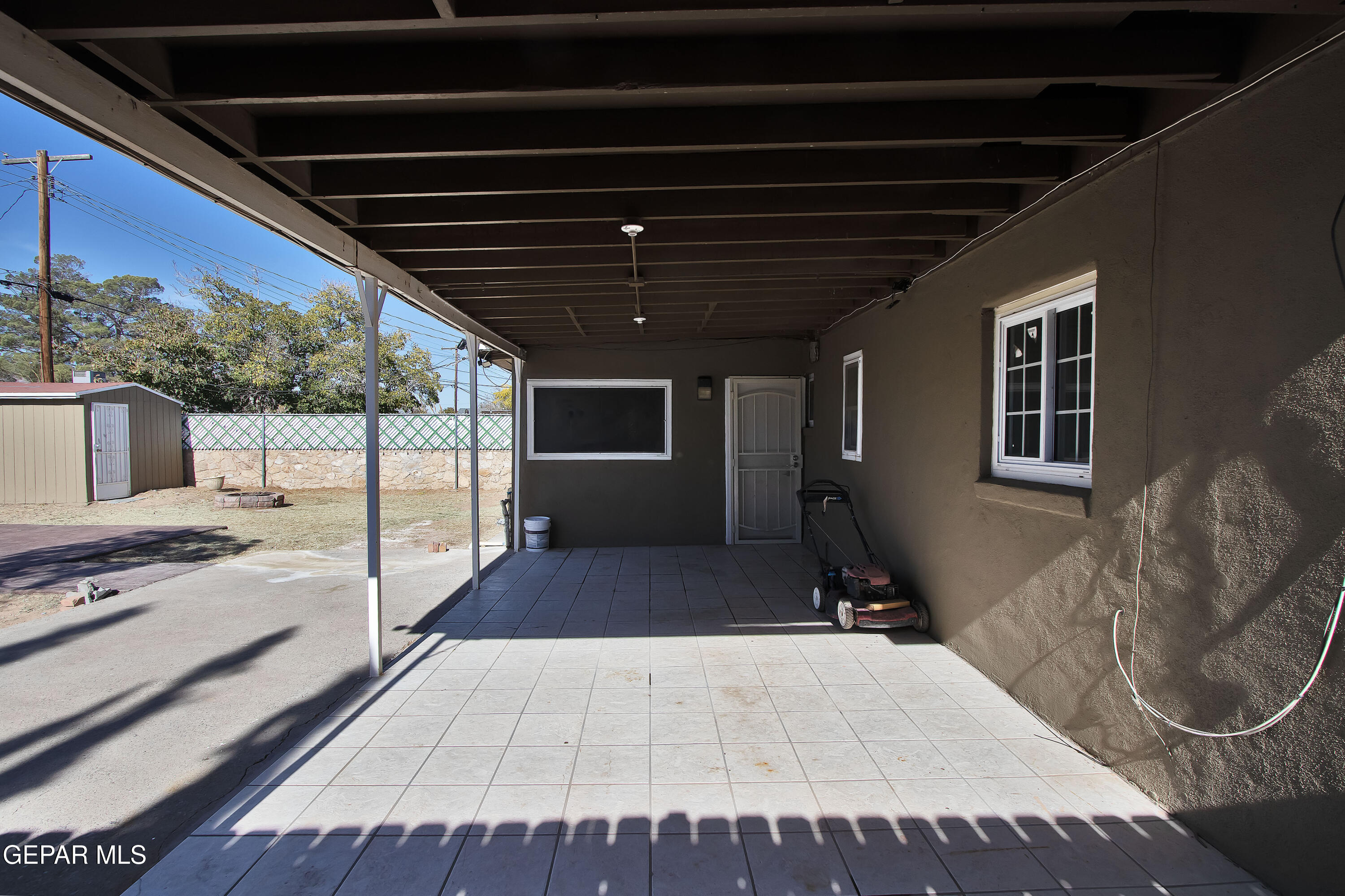 8415 Mt Ranier Drive El Paso, TX 79904 - Photo 56 of 69 a view of outdoor space with wooden floor and barbeque