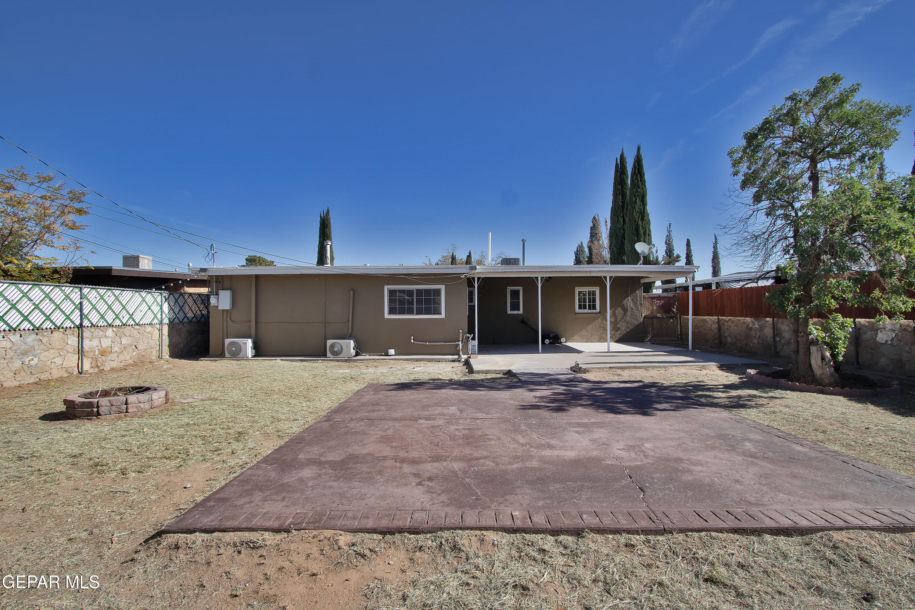 8415 Mt Ranier Drive El Paso, TX 79904 - Photo 62 of 69 a view of a house with backyard and a tree