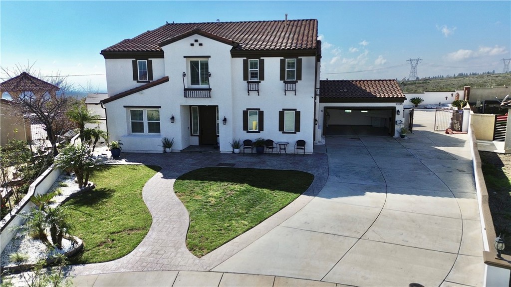 13538 Applegate Court Rancho Cucamonga, CA 91739 - Photo 1 of 30 a front view of a house with a yard