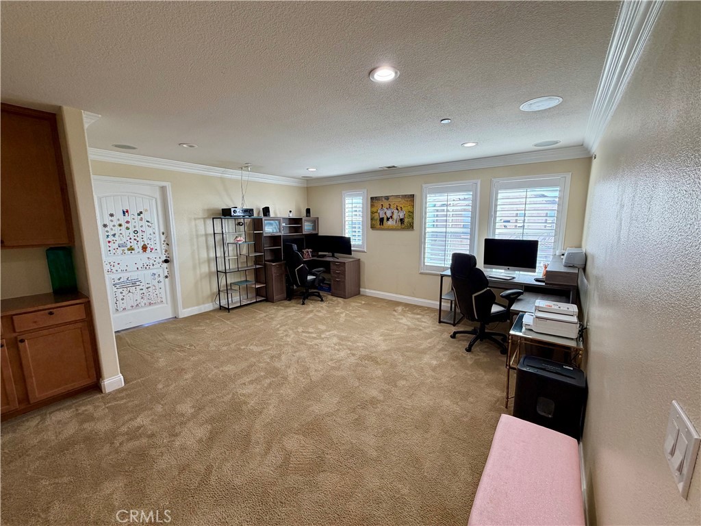 13538 Applegate Court Rancho Cucamonga, CA 91739 - Photo 12 of 30 a view of workspace with furniture and cabinet