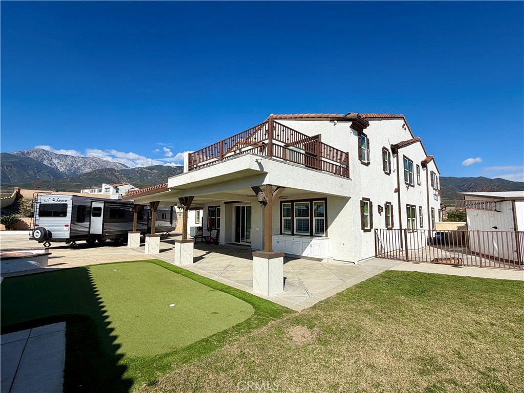 13538 Applegate Court Rancho Cucamonga, CA 91739 - Photo 20 of 30 a front view of a building with a yard