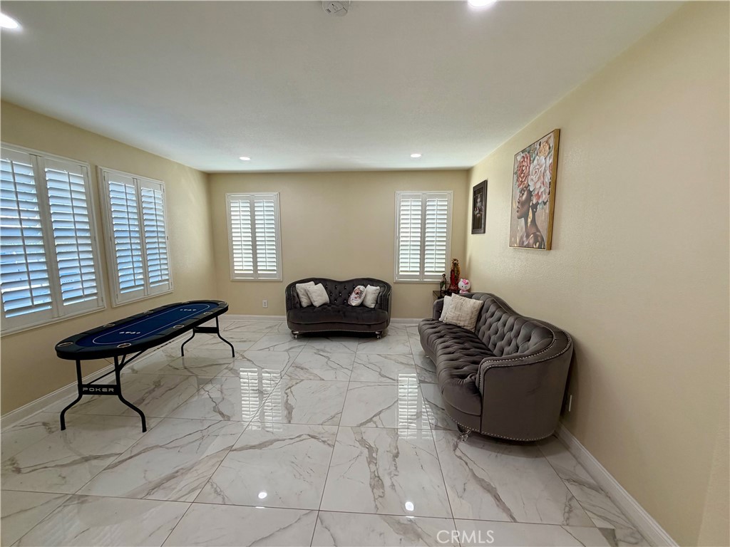 13538 Applegate Court Rancho Cucamonga, CA 91739 - Photo 3 of 30 a living room with furniture and a window