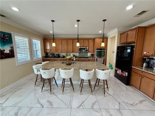 a view of a dining room with furniture