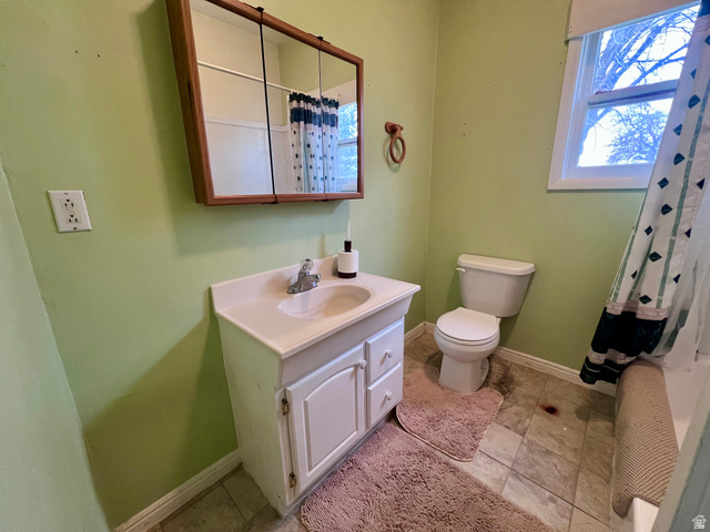 479 East 100 N Road Meadow, UT 84644 - Photo 11 of 59 Bathroom featuring vanity, a shower with curtain, and light tile patterned floors