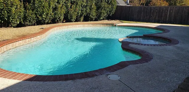 a view of a backyard with a small cabin