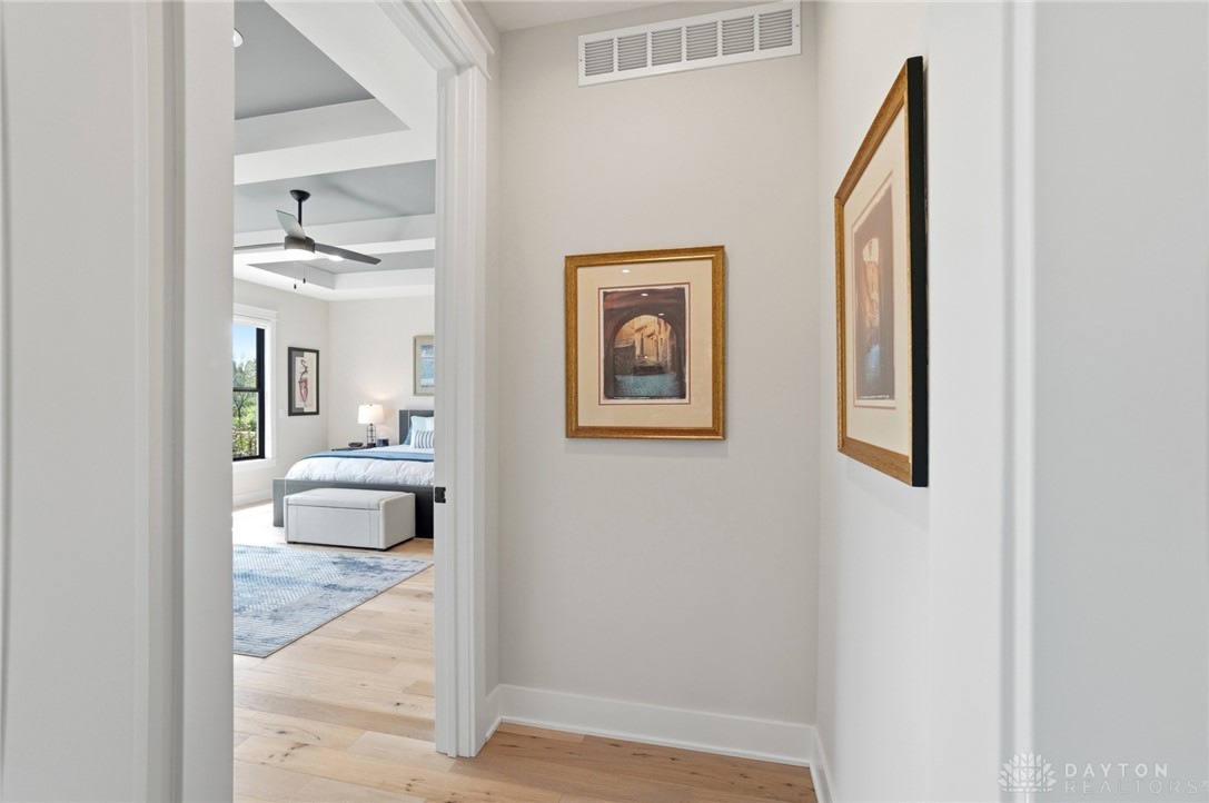 1247 Normandy Rue Dayton, OH 45458 - Photo 18 of 76 This tranquil bedroom features light wood flooring and a stylish tray ceiling.