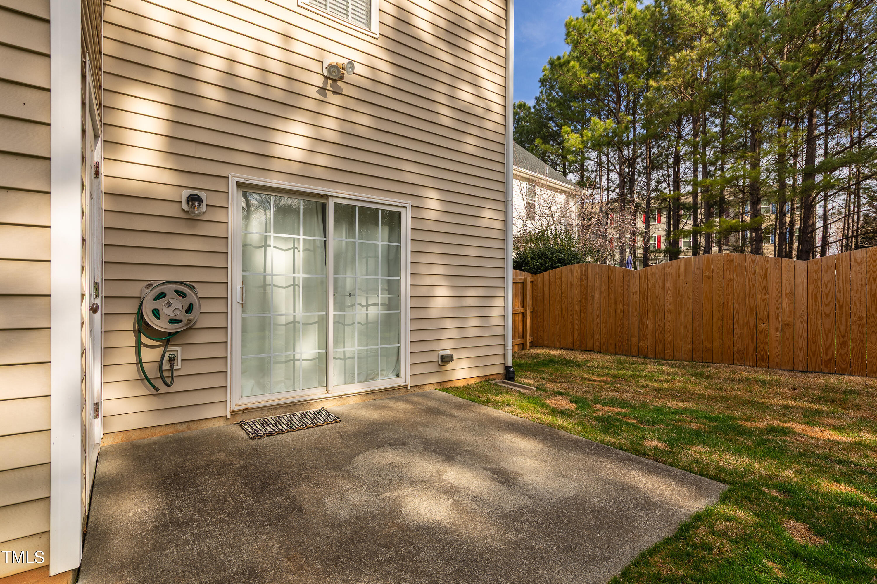 10809 Farmville Road Raleigh, NC 27614 - Photo 25 of 28 Backyard patio and extra storage locker