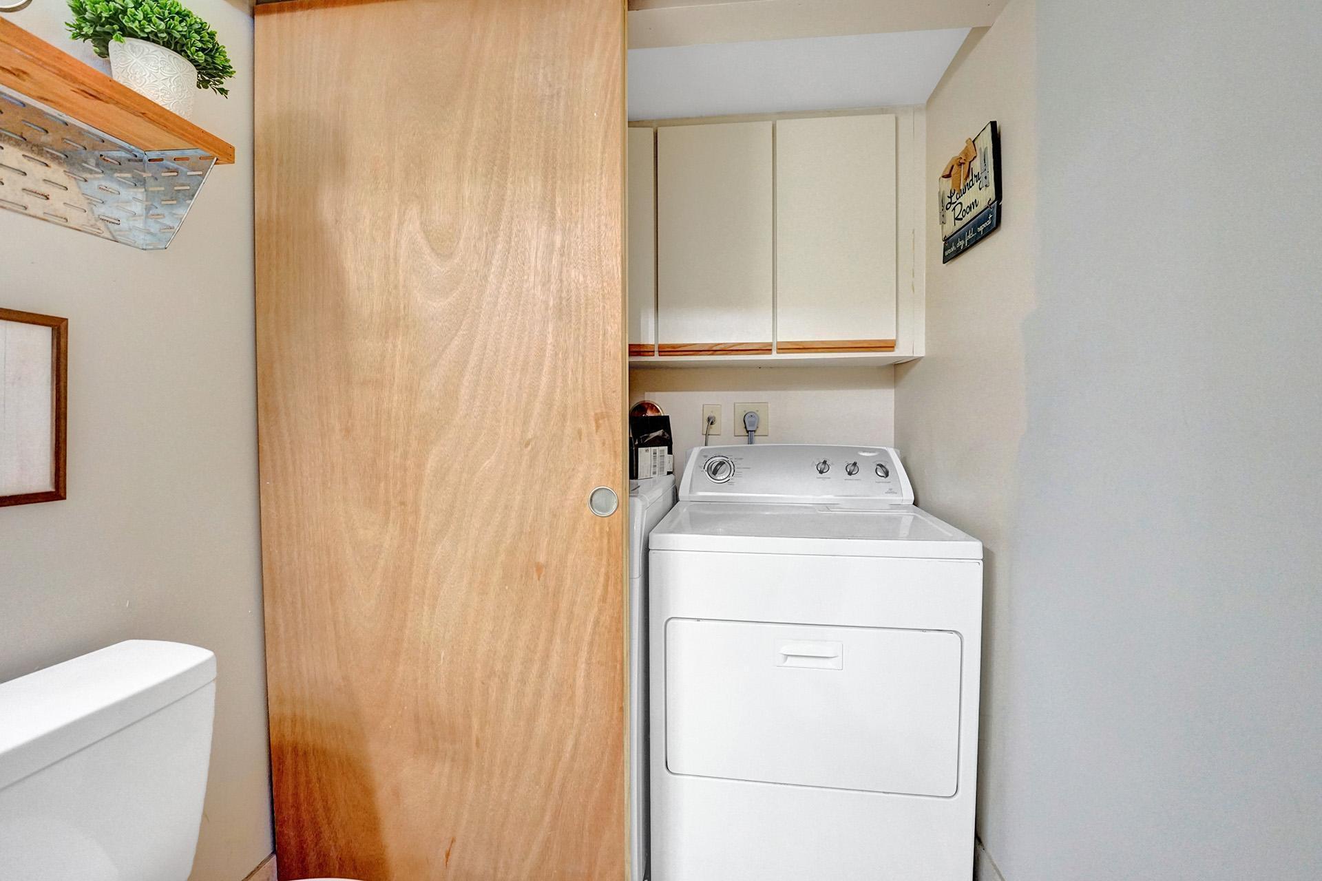 8115 Boca Rio Drive, Unit 21 Boca Raton, FL 33433 - Photo 24 of 49 Half bath/laundry