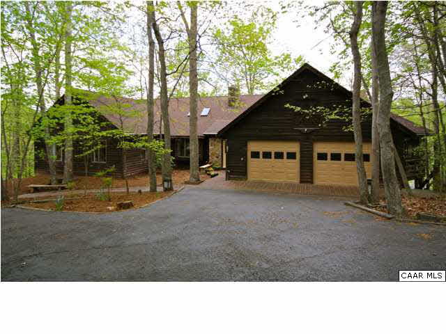 57 Laguna Road Palmyra, VA 22963 - Photo 1 of 32 a front view of a house with a yard