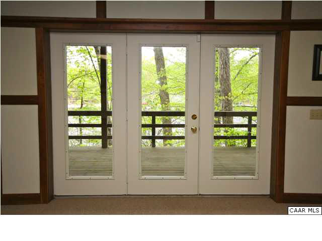 57 Laguna Road Palmyra, VA 22963 - Photo 23 of 32 a view interior of a house with large windows