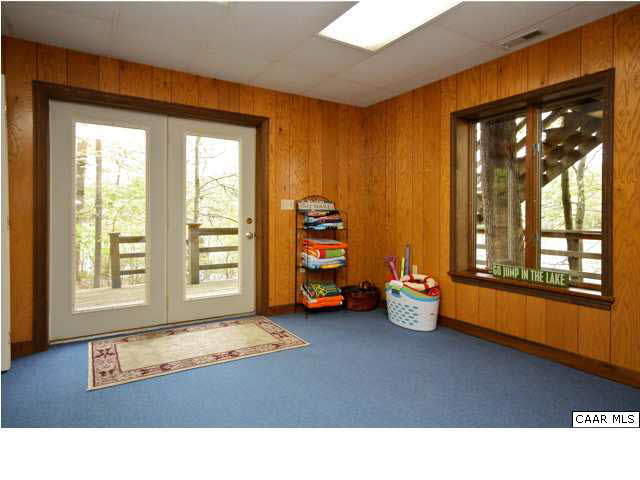 57 Laguna Road Palmyra, VA 22963 - Photo 24 of 32 a room with toys and flat screen tv