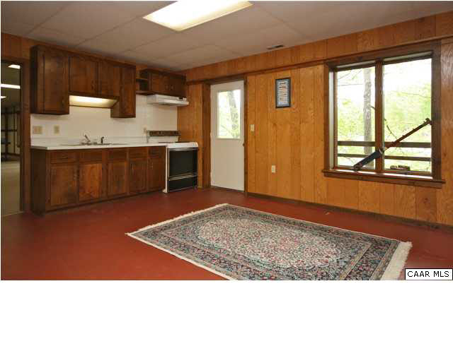 57 Laguna Road Palmyra, VA 22963 - Photo 25 of 32 a view of kitchen with granite countertop sink and dishwasher