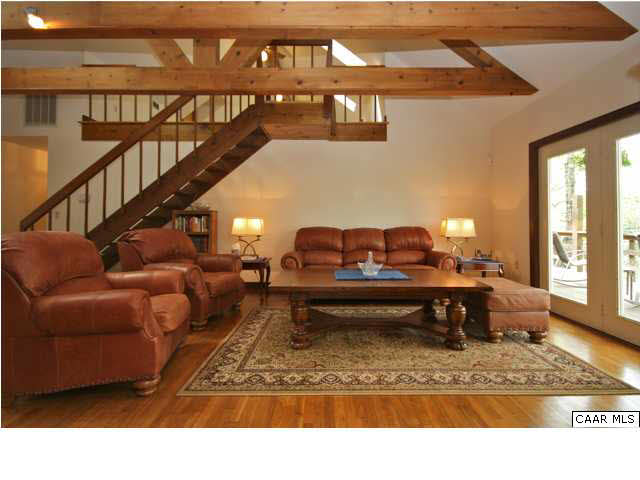 57 Laguna Road Palmyra, VA 22963 - Photo 4 of 32 a living room with furniture flowerpot and wooden floor