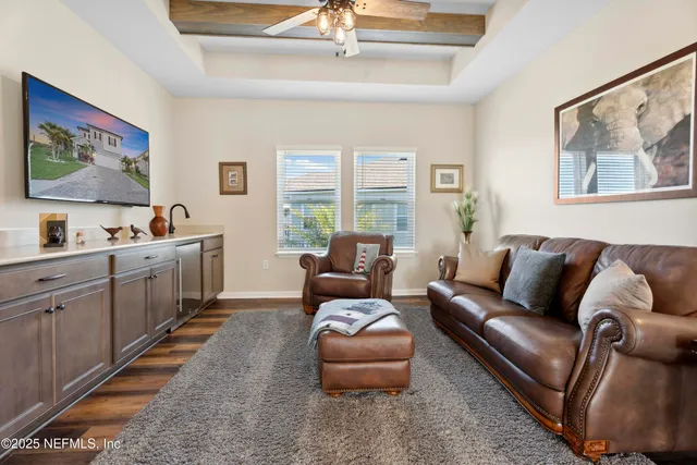 a bathroom with a granite countertop sink