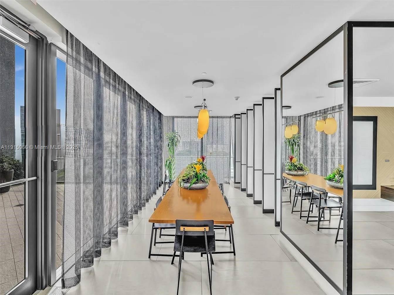 121 Northeast 34th Street, Unit 2811 Miami, FL 33137 - Photo 28 of 35 a dining room with furniture window and entryway