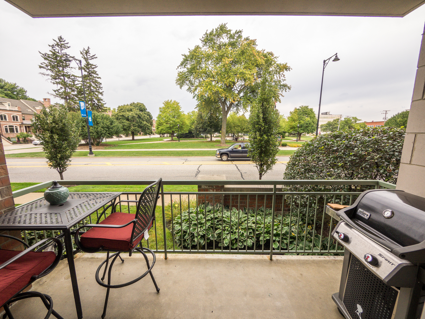 133 West Palatine Road, Unit 103A Palatine, IL 60067 - Photo 14 of 16 a view of swimming pool with outdoor seating and plants