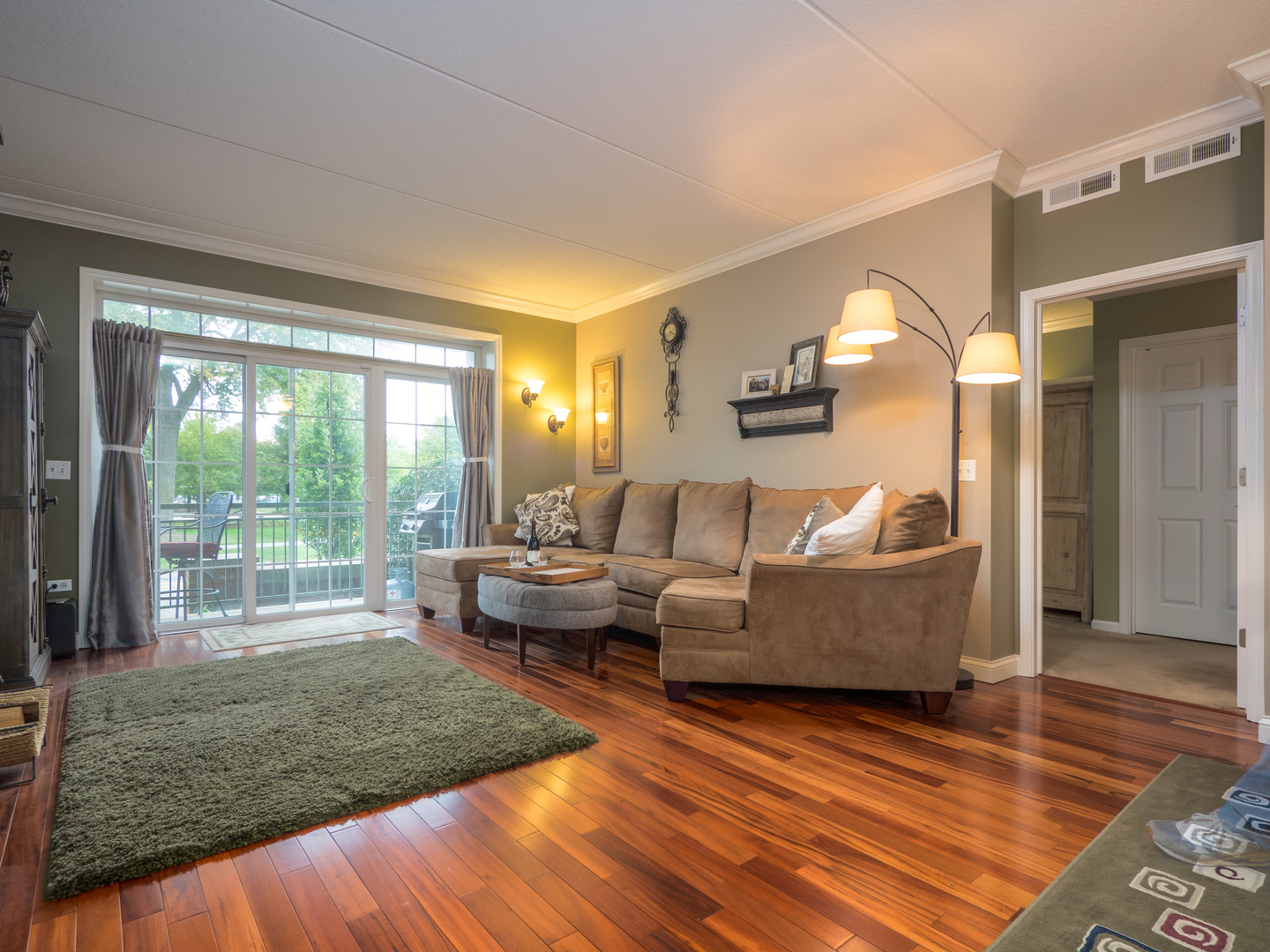 133 West Palatine Road, Unit 103A Palatine, IL 60067 - Photo 6 of 16 a living room with furniture and a wooden floor